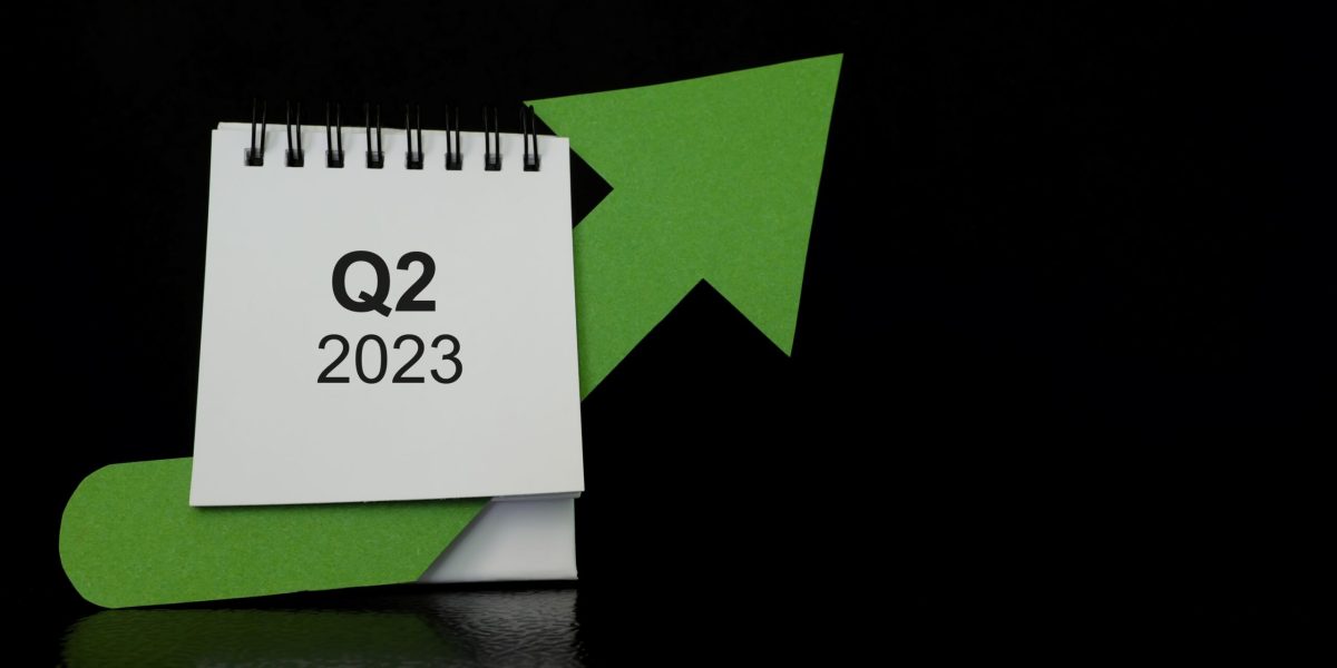 Second quarter of 2023 positive growth performance financial report and fiscal concept. Upward arrow with increasing coins and calendar in black background.